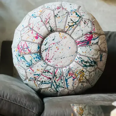 173137ef50c875a8b5658dbaaa48a5bede1833db0c34c022fe5577e444ee02a7.webp Rainbow Moroccan Round Leather Pouf 🌈✨