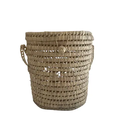 1c2df37e4e9f9c04d85136528e220c3aaf4cbe604f11d3a3e87cf0bada44ec7f-1.webp Handwoven Small Round Laundry Basket – Eco-Friendly Palm Leaf Storage