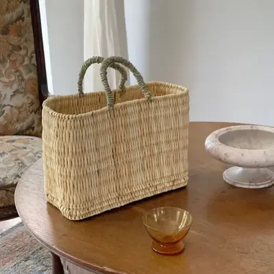 1f4fb6bf45bb7af4d2ff1963d424c264ff1033b5864f86714123bb15f7b6cdfd.webp Medina Tassel Basket - Handwoven Rattan Bag | Moroccan Boho Tote