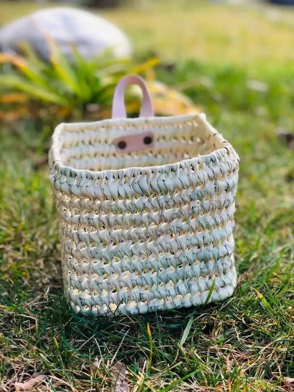 2d433255378904b250bbf811b2d1bc5c9018bff2e35f779cc84918eb8e7004ee-1.webp Duo of Woven Palm Fiber Baskets | Handmade Moroccan Wall Storage