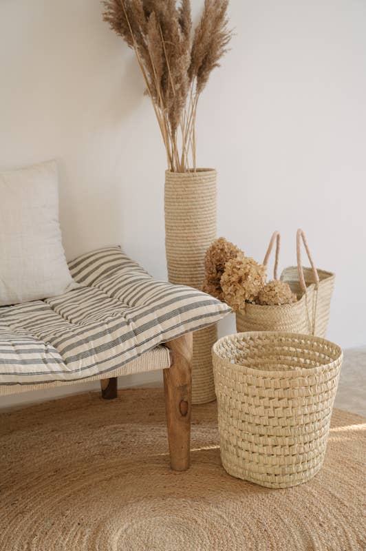 3eec2c4c2cd8837d4e06ef0df7c74a1aea06164cb2572baea632dc25983a12ae-1.jpeg Handwoven Round Palm Leaf Basket – Versatile Moroccan Storage & Decor