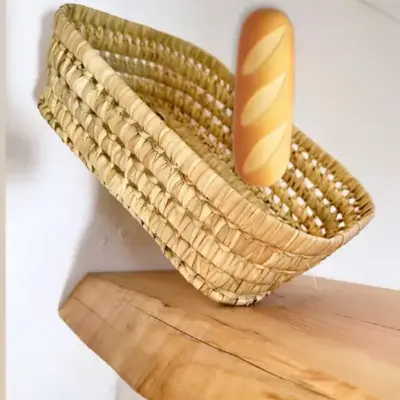 61591eec05d7147d064eb09ac7d2dfa8e43af3c214982968977bbe0cbf7256a7-1.webp Handwoven Basketball Bread & Fruit Basket – Rustic Kitchen & Dining Decor