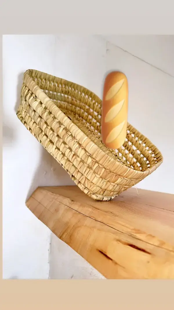 61591eec05d7147d064eb09ac7d2dfa8e43af3c214982968977bbe0cbf7256a7-1.webp Handwoven Basketball Bread & Fruit Basket – Rustic Kitchen & Dining Decor