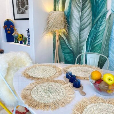 68f1bb7e2249264e47b485238ac79dd156ee8075aafbb5ea89ac6ad17e05faf8-1.jpeg Handwoven Wicker Moroccan Placemats with Tassels – Boho Table Decor