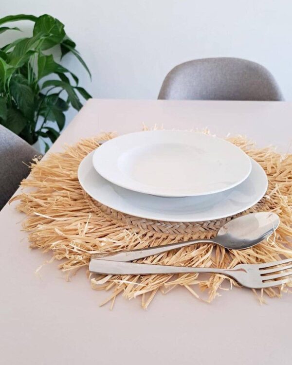 6f599546302e11e9e65ef9d0d41c5966db0fdebdf2f0dd53c39ade2d2d3d1924-1.jpeg Handwoven Wicker Moroccan Placemats with Tassels – Boho Table Decor