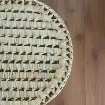 71634322123fa9a31eb3a06a8c3d62b25f599878ab72e43bdd350d5dcd88b2b4-1.webp Handwoven Small Round Laundry Basket – Eco-Friendly Palm Leaf Storage