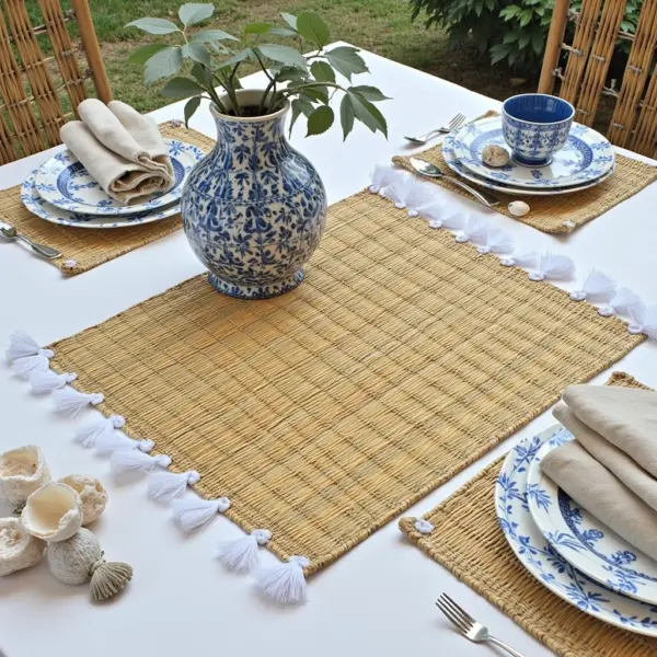 722f2c6a-4a32-4fd9-bb13-affe1abda17a.webp Hand-Woven Moroccan Tassel Placemats – Rattan & Cotton Dining Decor (15.5″ × 12″)
