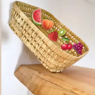 95152e984a60adffa6f18b429096a220ad64dc8ec3d32199c2534ad49cb79798-1.webp Handwoven Basketball Bread & Fruit Basket – Rustic Kitchen & Dining Decor