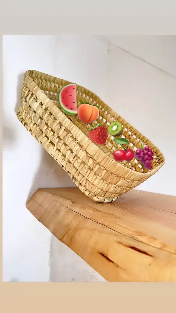 95152e984a60adffa6f18b429096a220ad64dc8ec3d32199c2534ad49cb79798-1.webp Handwoven Basketball Bread & Fruit Basket – Rustic Kitchen & Dining Decor
