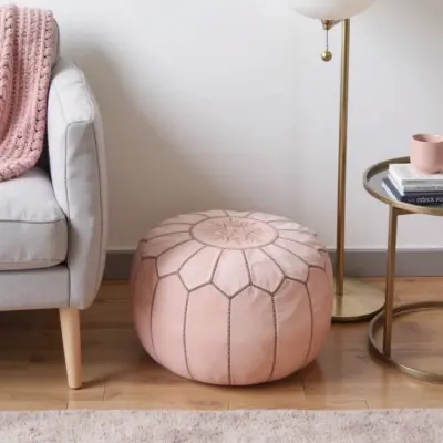 Handcrafted-Moroccan-Leather-Pink-Pouf-in-Piggy-Pink-4.webp Pink Moroccan Leather Pouf Ottoman – Handcrafted Round (21″ × 12″) with Starburst Stitching
