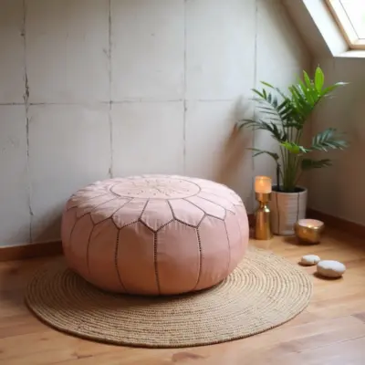 Handcrafted-Moroccan-Leather-Pink-Pouf-in-Piggy-Pink-6.webp Pink Moroccan Leather Pouf Ottoman – Handcrafted Round (21″ × 12″) with Starburst Stitching