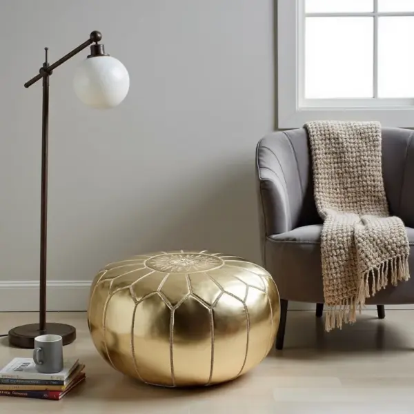 Handcrafted-Moroccan-Leather-Pouf-Gold-3-1000x1000-1.webp Gold Moroccan Leather Pouf – Handcrafted Round Ottoman with Matching Embroidery (21″ × 12″)
