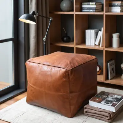 Moroccan-Square-Leather-Pouf-Natural-Brown-2.webp Moroccan Square Leather Pouf – Handcrafted Light Brown Ottoman (16″ × 16″ × 16″)