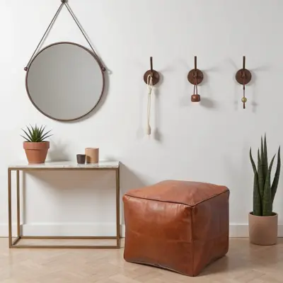 Moroccan-Square-Leather-Pouf-Natural-Brown-7.webp Moroccan Square Leather Pouf – Handcrafted Light Brown Ottoman (16″ × 16″ × 16″)