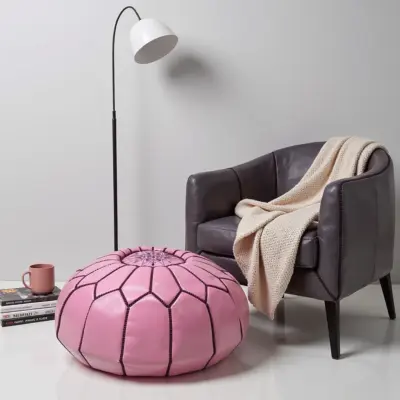 Pink-Round-Handcrafted-Moroccan-Pouf-in-Genuine-Leather-1.webp Handcrafted Moroccan Pink Leather Pouf – Round Ottoman (20″ × 12″)