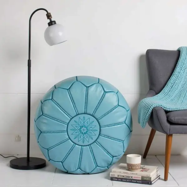 Round-Moroccan-Leather-Pouf-Blue-Sky-1.webp Sky Blue Leather Pouf Ottoman – Handcrafted Moroccan Round Pouf (21″ × 12″)