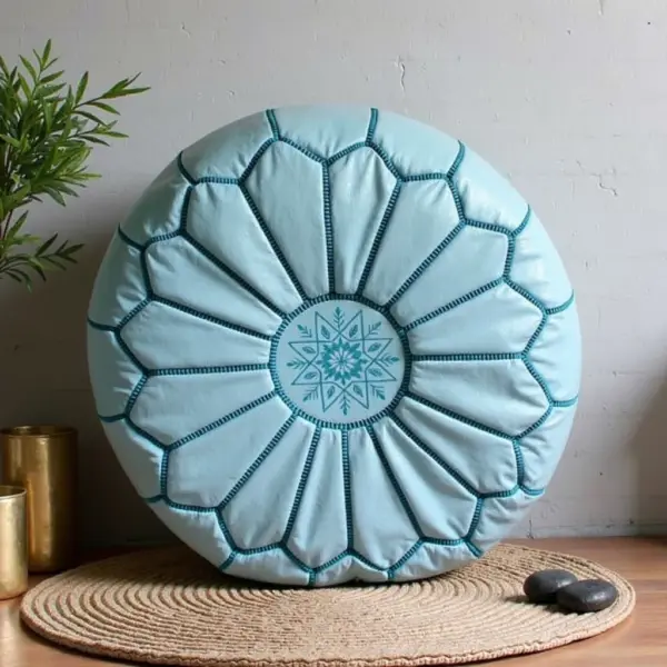 Round-Moroccan-Leather-Pouf-Blue-Sky-3.webp Sky Blue Leather Pouf Ottoman – Handcrafted Moroccan Round Pouf (21″ × 12″)