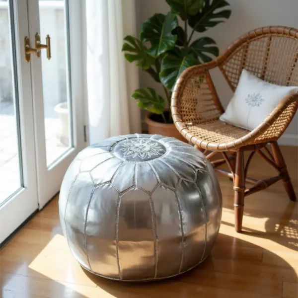 Round-Moroccan-Leather-Pouf-Silver-6.webp Silver Leather Pouf – Handcrafted Moroccan Ottoman (21″ × 12″) with White Stitching