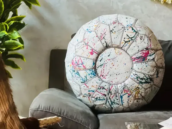 a88361c88a39fdd3557d4f2c1a6df26f9cba9b7d047ede9782d3c24a0edad7ea.webp Rainbow Moroccan Round Leather Pouf 🌈✨