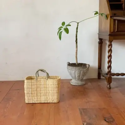 a8e42b57a670227d1ce790585c9a041541f5f3cc5ae1624d316fc54485f0870a.webp Medina Tassel Basket - Handwoven Rattan Bag | Moroccan Boho Tote