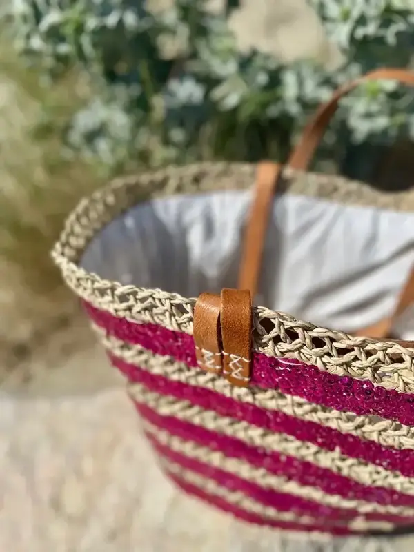 a8e5132fa18044457bc1607d1b42073a3b38d6ff52cbf026a284ae88c505ac2b-1.webp Sequin Basket – Handwoven Doum Palm Fiber Tote with Leather Handles & Drawstring Closure
