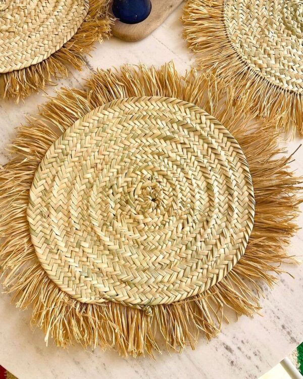 ae7d80d09318018f94e030c4a4b1d8fac030e7dc83bca44ce831ca09dc700922-1.jpeg Handwoven Wicker Moroccan Placemats with Tassels – Boho Table Decor