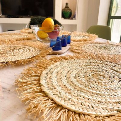 c0c21365e0cae98bd6b8e4d5c54a166831127a49d1bd65bf492f67e380f5dc96-1.jpeg Handwoven Wicker Moroccan Placemats with Tassels – Boho Table Decor