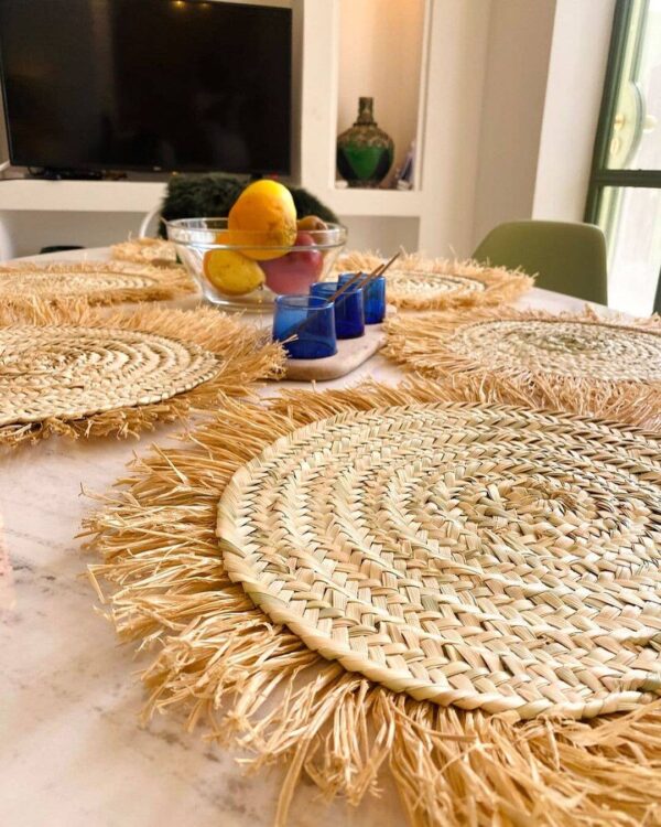 c0c21365e0cae98bd6b8e4d5c54a166831127a49d1bd65bf492f67e380f5dc96-1.jpeg Handwoven Wicker Moroccan Placemats with Tassels – Boho Table Decor