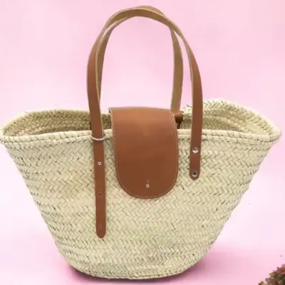 c5f1b70044baf20c660056ebcd56ffb886b34419a1c37690f57df0382e5dcd3b-1.webp French Straw Tote Bag – Handwoven Palm Leaf Basket with Tan Brown Leather Handles
