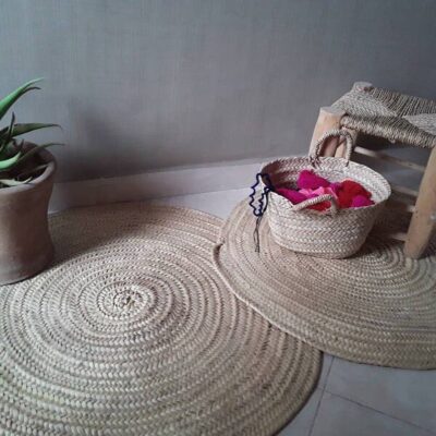 caaa7e93ef8cee67ca610f3043f0d35eecece40abb8352f468bdca0beb79ef4c-1.jpeg πΈποΈ Round Braided Carpet in Palm Leaf