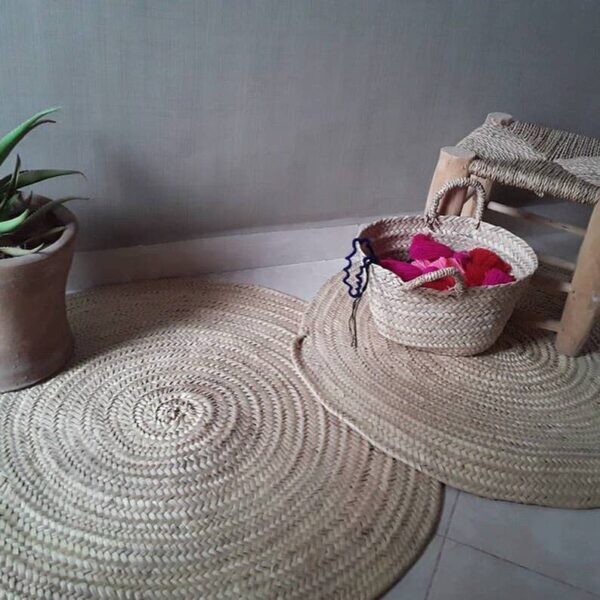 caaa7e93ef8cee67ca610f3043f0d35eecece40abb8352f468bdca0beb79ef4c-1.jpeg πΈποΈ Round Braided Carpet in Palm Leaf