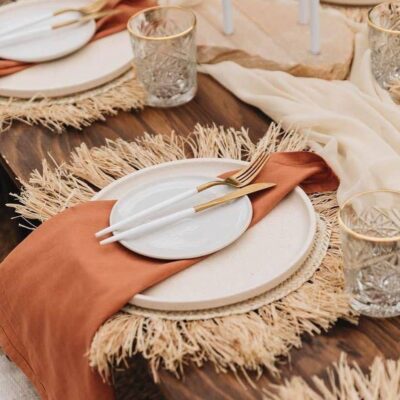 cccfad8c2a9c454221a47738d6900f890ee8a3de655b81624ff788c50d4e7006-1.jpeg Handwoven Wicker Moroccan Placemats with Tassels – Boho Table Decor