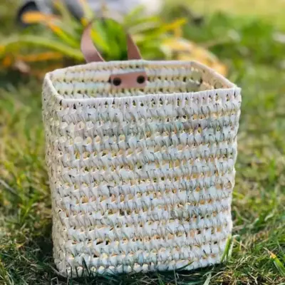 d0294c5e6881e177d8cd97cc511430c3f58ff3c0bffb94312154940e7c1fdc81-1.webp Duo of Woven Palm Fiber Baskets | Handmade Moroccan Wall Storage