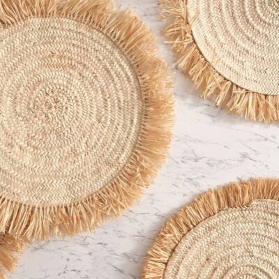 e1aadb839641f90f41ae0005ec0e3152917ea3b939b220b285ddc75225d5e63a-1.jpeg Handwoven Wicker Moroccan Placemats with Tassels – Boho Table Decor