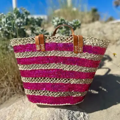 ed5a411eb9a2f88e75f272fceefdc39a6027b326ef82182fecc052a1b0d6fc3d-1.webp Sequin Basket – Handwoven Doum Palm Fiber Tote with Leather Handles & Drawstring Closure
