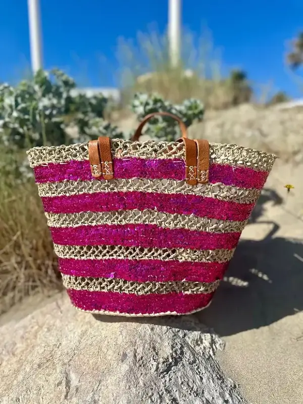 ed5a411eb9a2f88e75f272fceefdc39a6027b326ef82182fecc052a1b0d6fc3d-1.webp Sequin Basket – Handwoven Doum Palm Fiber Tote with Leather Handles & Drawstring Closure